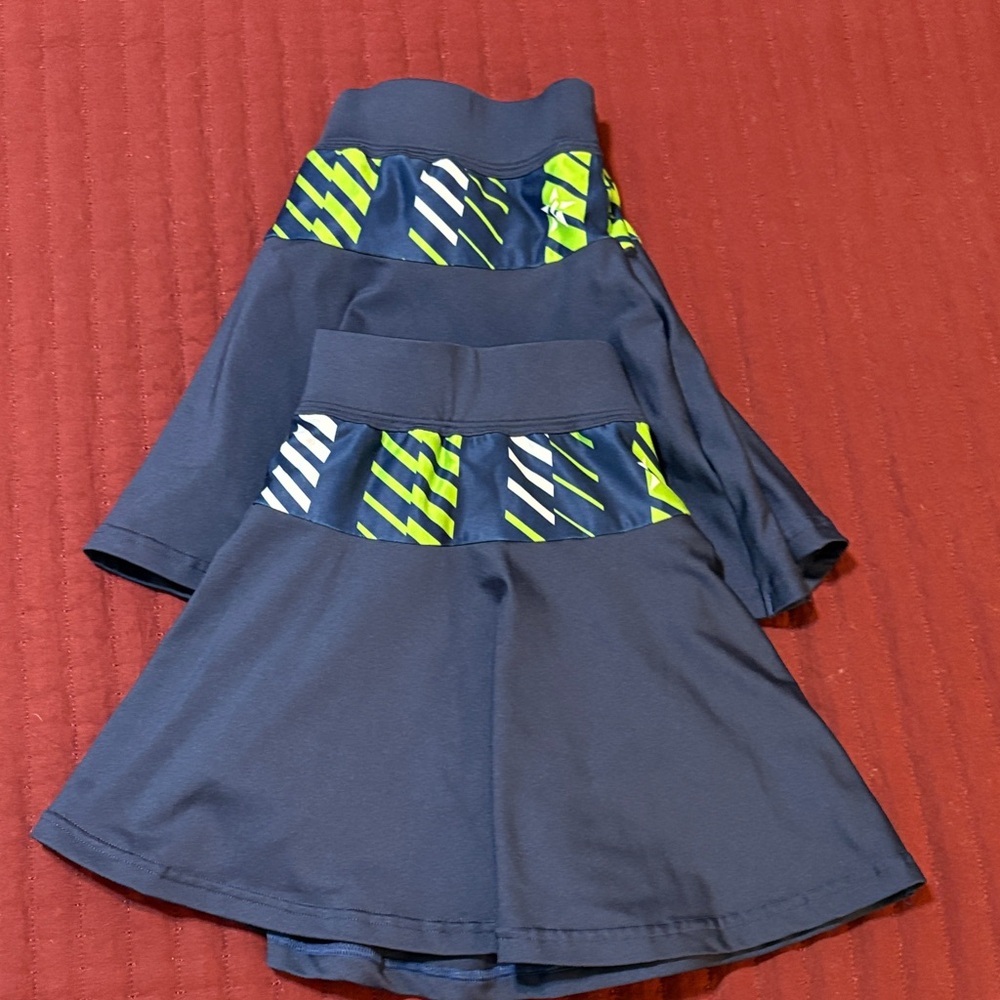 Lot of 2 Rebel Athletic Navy Skorts with Green/White Accents Size Adult Med